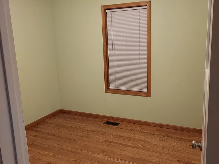 Bedroom #2 ( greenroom) from hall .