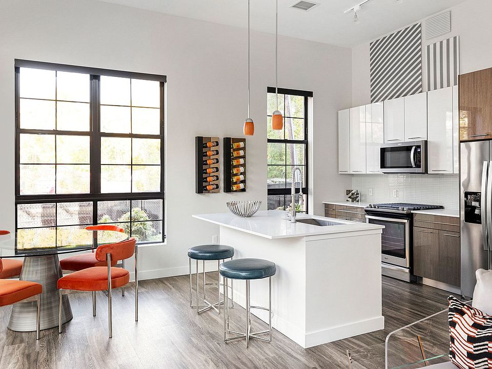 The chef-inspired kitchens feature gas stoves, stainless steel appliances and quartz countertops