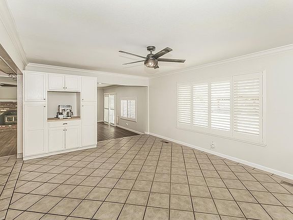 4th image of 6038 N Roosevelt Ave