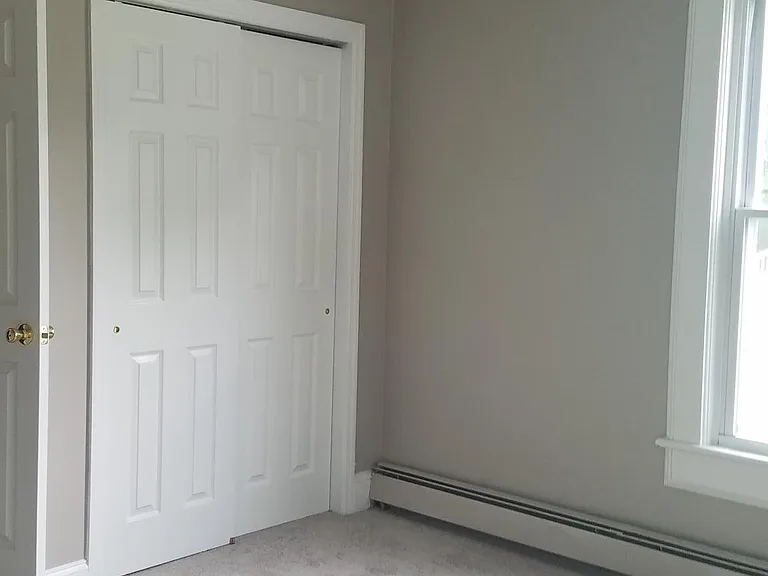 Front Bedroom with ceiling fan
