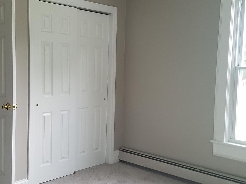 Front Bedroom with ceiling fan