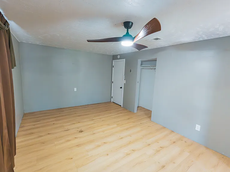 Fourth Bedroom (downstairs) next to downstairs living area/office space