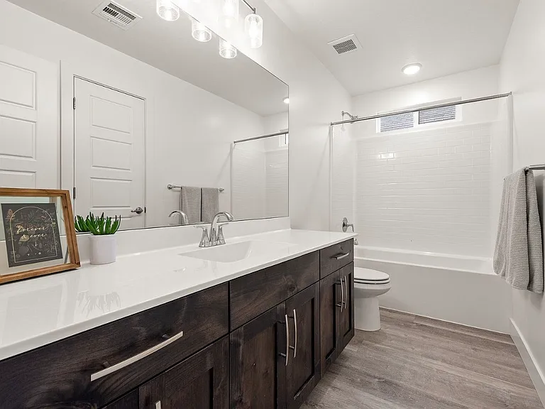 shared bathroom, large closet on wall, has plenty of storage