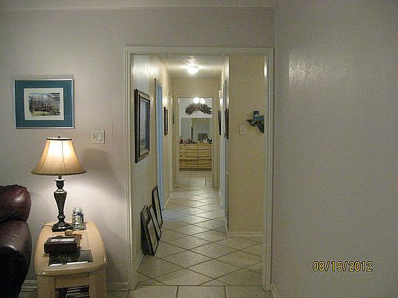 View from den down hall way to bedrooms