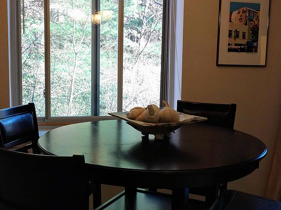 Hi-top dining room table and chairs - yours to use if you rent!