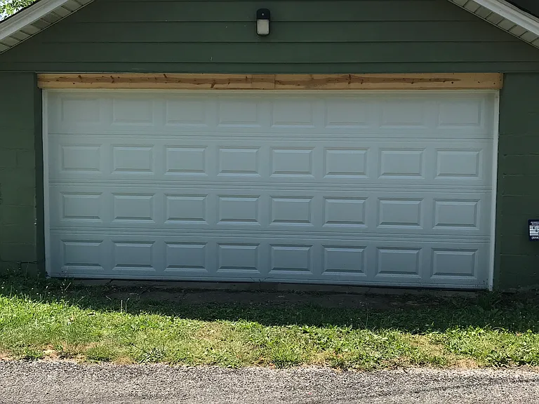 New garage door with opener.