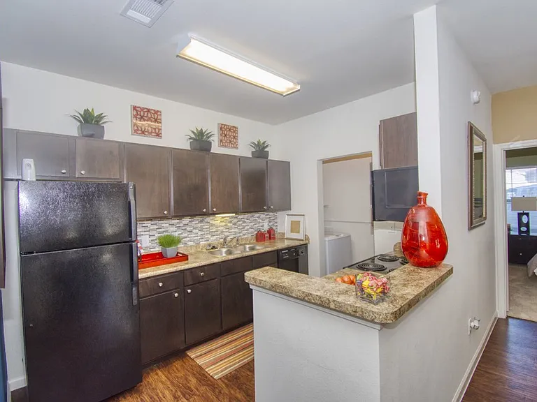 Fully equipped kitchen with ample cabinet space