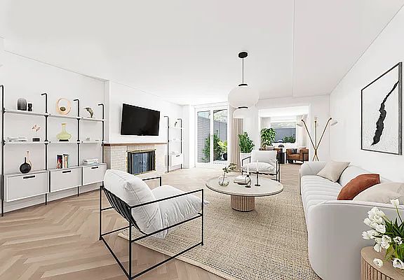2nd image of 124 E 61st St #Townhouse