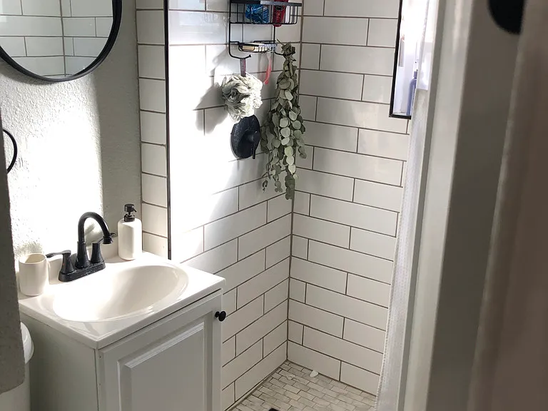 Bathroom with subway tiles and south facing window.
