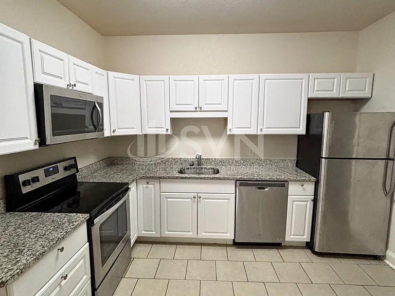 The Woodlands Apartments — Photo 11