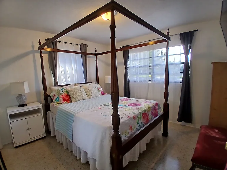 Bedroom, angle #1, good natural light, corner bedroom.