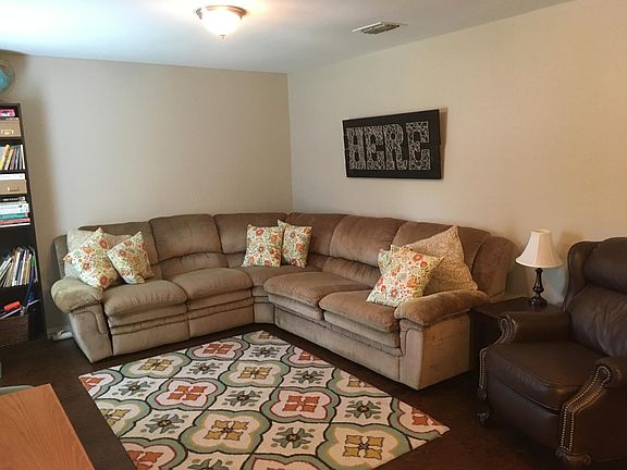 As you enter the front door, you walk into a bright living area.