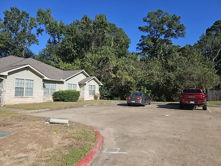 Ample parking infront of home. There are 6 total parking spots associated with this home. (Shared)