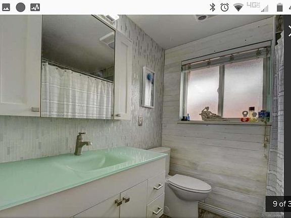 Updated bathroom with blended modern and rustic accents