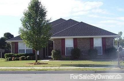 House Front
						:
						Cozy front door entrance. Flower beds freshened up with new mulch and edging.