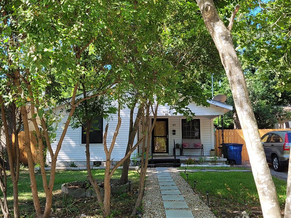 Mature trees in the front provide good shading to beat the Texas heat!