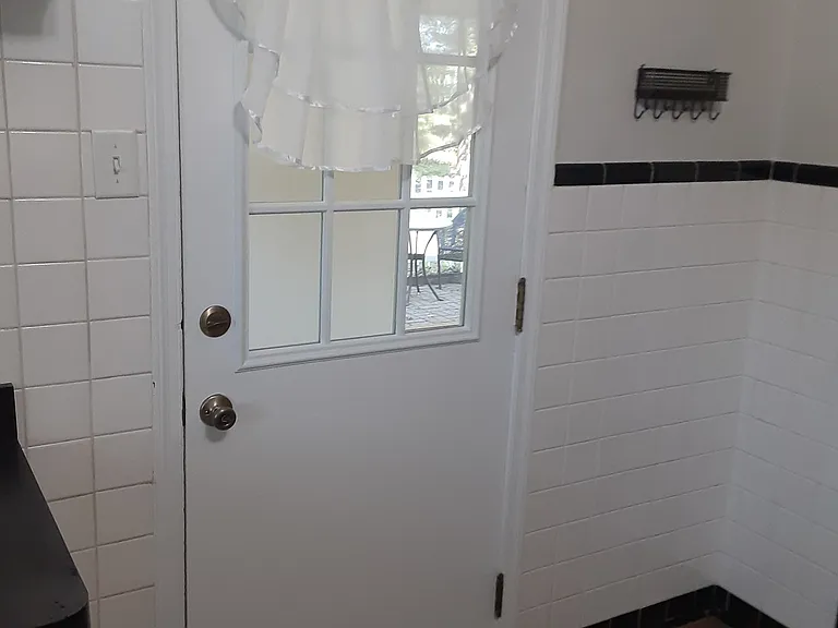 Newest Attribute that allows even more light into the kitchen via the entry door. VERY NICE!