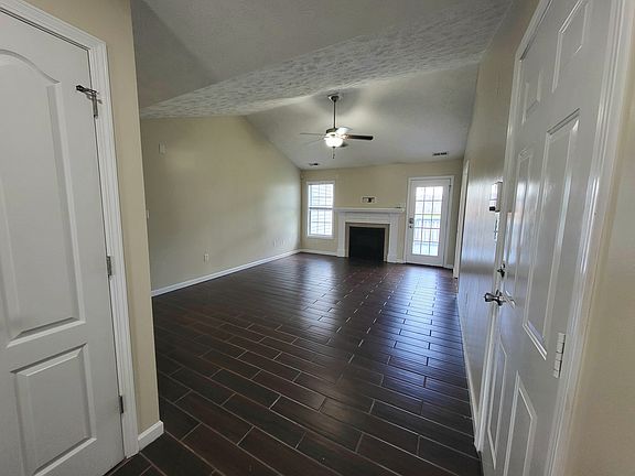 Gas log fireplace.
Cordless window blinds.
Tile flooring. Vaulted ceiling.