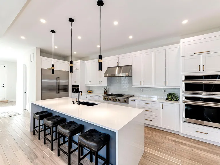Gourmet kitchen with upscale Monogram appliances.