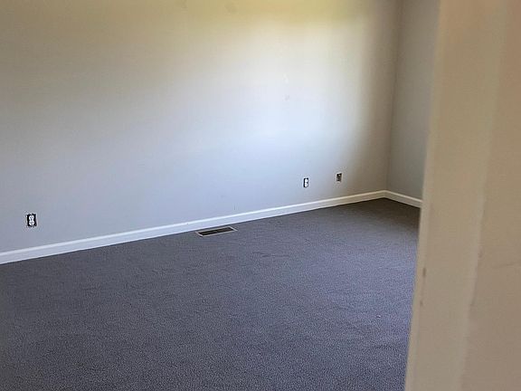 Main floor bedrooms with updated carpet and paint.