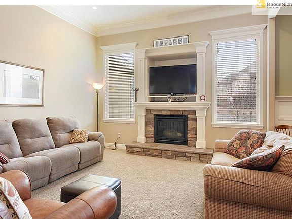 Living room with stone fireplace