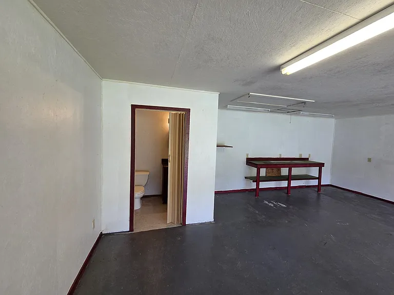 Half bath in back of 2 car garage