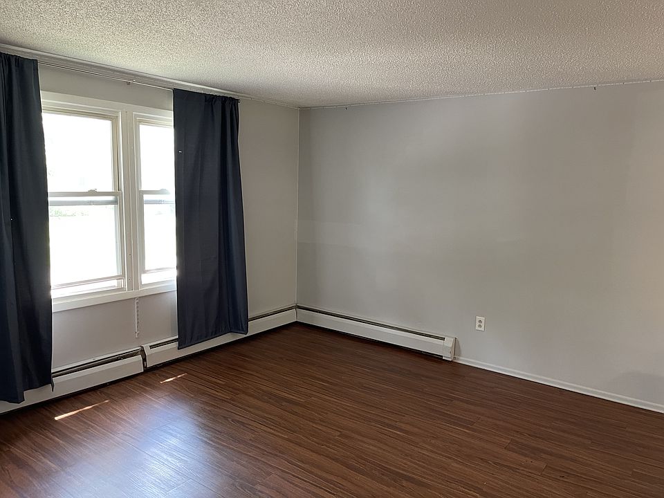 2 large front windows in Living Room