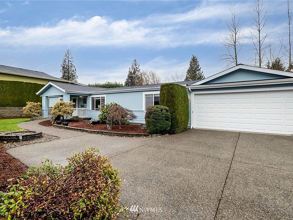 Front view of the home with a 2 car garage