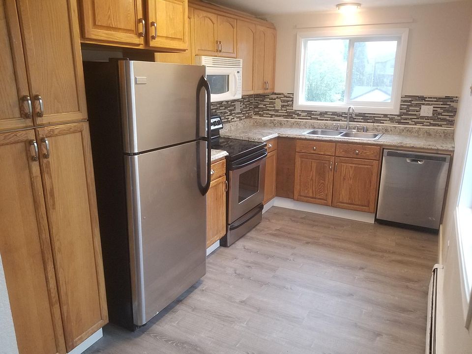 Kitchen with new counter tops & stainless steel appliances!