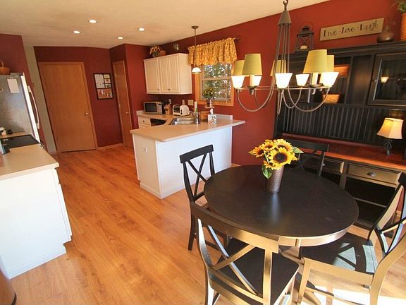 Sunny Dinette opens to the Wood Deck
