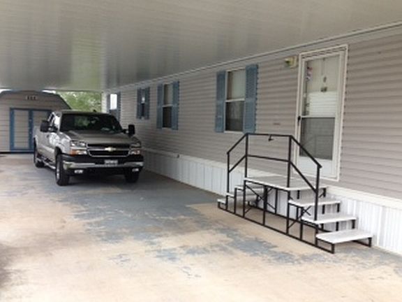 Spacious Carpot with Shed