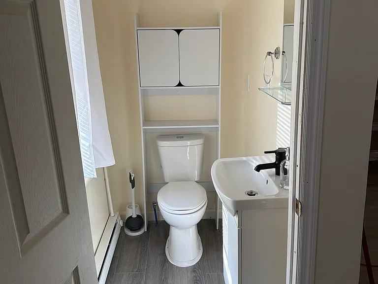 Half bathroom on the first floor for guests.