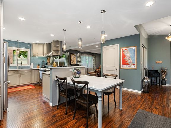 Open eating area to kitchen, dining area and family room
