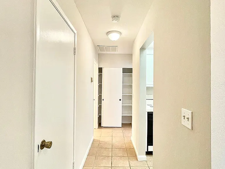 hallway to bedroom from front