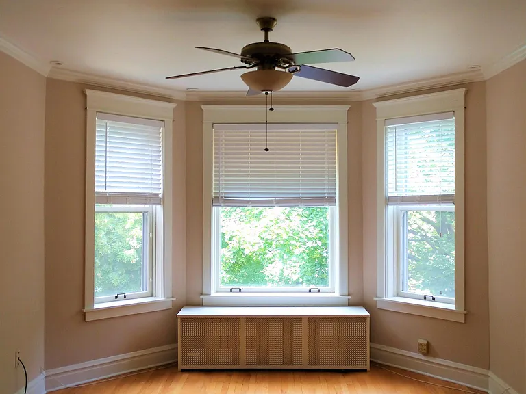 Light filled living room with neutral paint