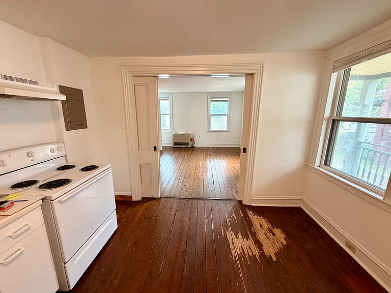 Looking into bedroom/living room space from kitchen.