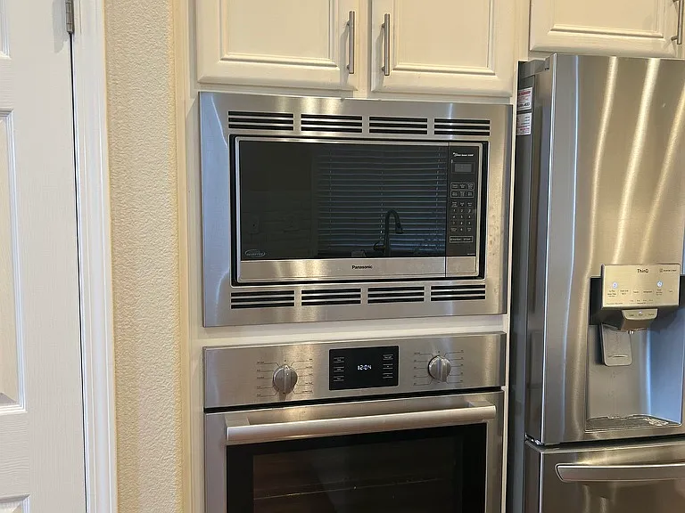 Kitchen appliances, freshly painted interiors