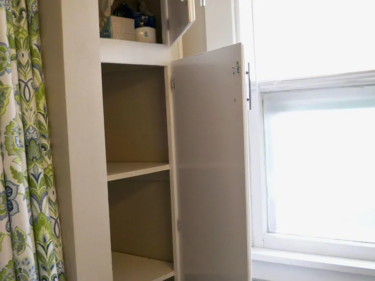 Bathroom (view #2) - linen closet/storage.