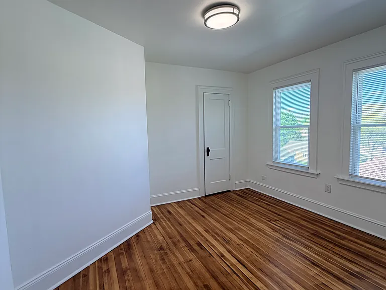 Third bedroom left of bathroom