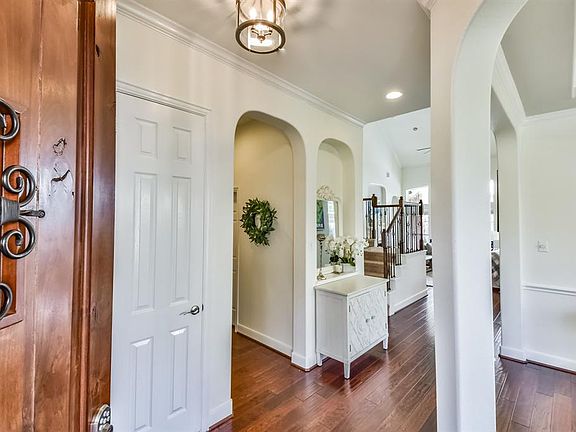 As you enter you are immediately delighted by bright feel of the home and the newly painted designer paint throughout.