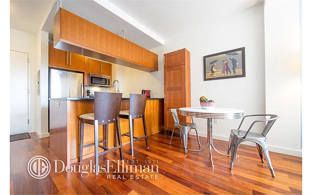 Sold by Douglas Elliman | media 12