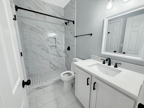 Downstairs bath can be used as Primary bathroom has dual doors