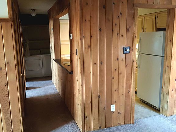 Paneled with real Cedar wood. Not fake wood