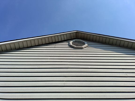 Soffit loose on left elevation