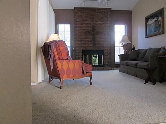 Large Living Room with Fireplace 12x17, Opens to the Kitchen, Patio, and Breakfast Nook