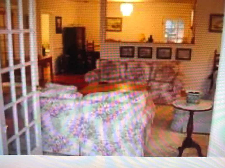 Waterfront den at 5221 Green Cove waterfront 4BR/2BA house and pier in Lake Wylie, SC FSBO for $899,000.