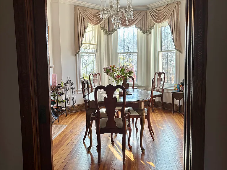 Looking at dining room through the pocket door from the living room