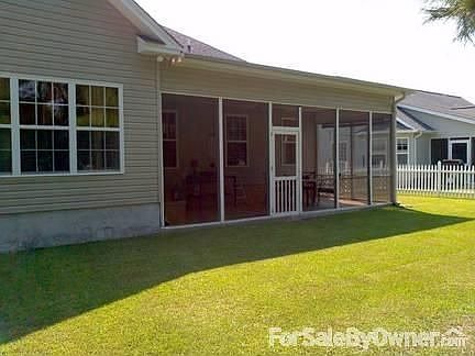 Back yard & porch. Exterior lighting. Guttering.