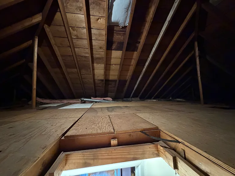 Abundant storage space in attic.