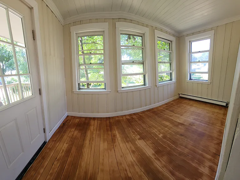 Bonus room off the kitchen. Has heat.
